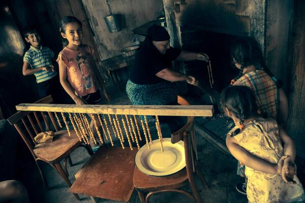 Family making churchkhela